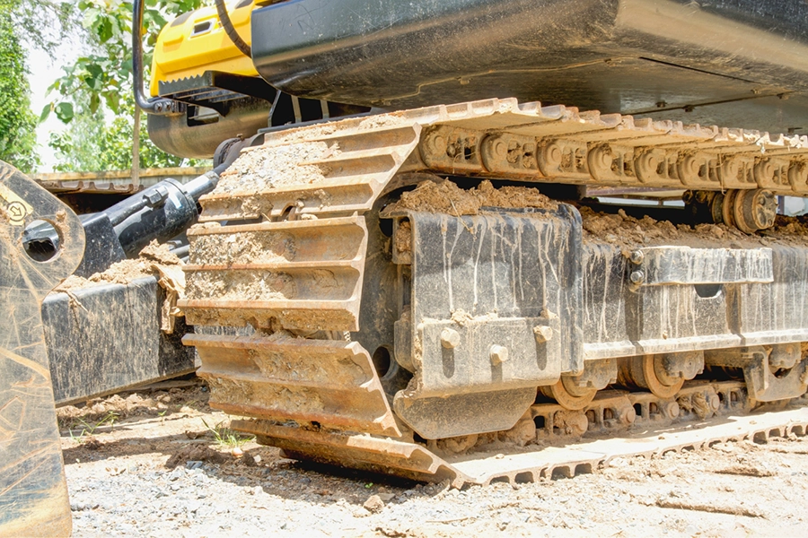 Yellow crawler excavator.
