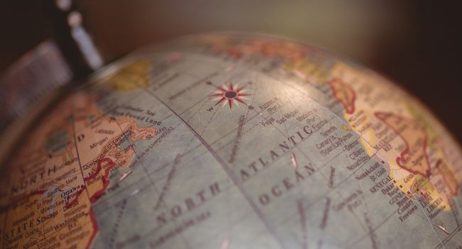 Globe over North Atlantic Ocean.